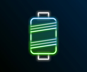 Glowing neon line Sewing thread on spool icon isolated on black background. Yarn spool. Thread bobbin. Colorful outline concept. Vector