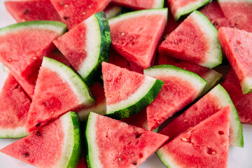 Pieces of watermelon on a wooden table close up