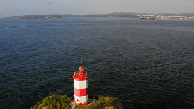 Drone view of the picturesque old Basargin lighthouse on the coast of the sea