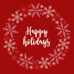 Christmas greeting card with snowflakes and sparkles on red background