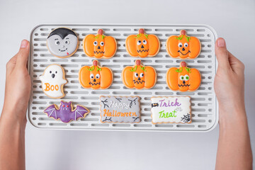 Halloween funny Cookies on tray. Trick or Threat, Happy Halloween, Hello October, fall autumn,...