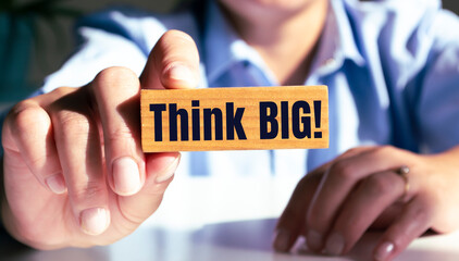 Text sign showing Think big.