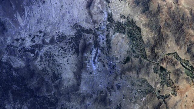 Dusk on Kabul, Afghanistan capital, aerial satellite view animation. Image furnished by Nasa