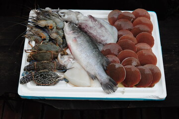 Raw Seafood,  Scallop, Sea bass, Shrimp, Squid