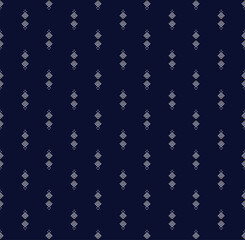 Fototapeta na wymiar Seamless Geometric ethnic embroidery on dark blue background Textutre used for wallpaper,skirt,carpet,wallpaper,clothing,wrapping,Batik,fabric,sheet in Vector,illustration style.eps