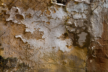 Fassade Lost Place Farbe Oberfläche Hintergrund verwittert alt Risse abblättern gelb beige grau...