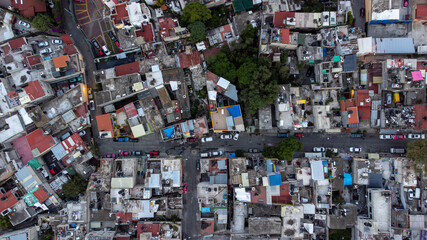 bird's eye view of a neighborhood street with drone