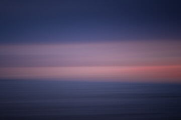 Abstract background cloudy sunset on sea
