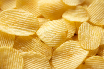 crispy golden potato chips snack texture background