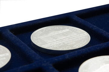 Modern silver bullion coin in tray