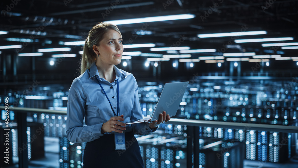 Aufkleber portrait of it specialist using laptop in data center. big server farm cloud computing facility with