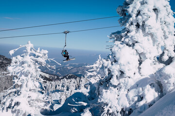 Kopaonik National Park, winter landscape in the mountains, coniferous forest covered with snow....