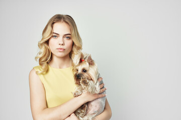 woman fashionable purebred dog light background Studio