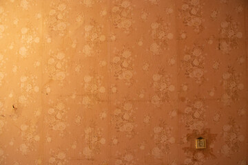an old room in a Soviet apartment in Ukraine without renovation with empty walls and torn...