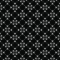 Flower geometric pattern. Seamless vector background. White and black ornament. Ornament for fabric, wallpaper, packaging. Decorative print 