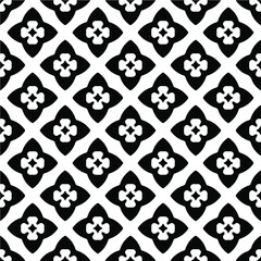 Fototapeta na wymiar Flower geometric pattern. Seamless vector background. White and black ornament. Ornament for fabric, wallpaper, packaging.Decorative print 