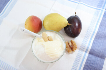 Naklejka na ściany i meble Natural yogurt or yoghurt with cream, fruits and nuts.