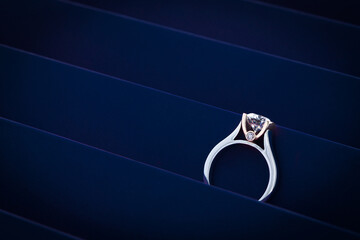 Diamond Ring on Dark Blue Background