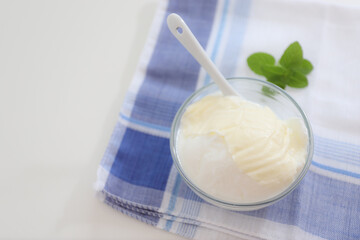 Natural yogurt or yoghurt with cream and mint