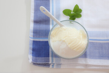 Natural yogurt or yoghurt with cream and mint
