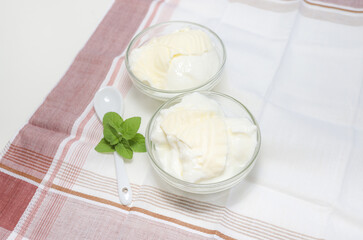 Natural yogurt or yoghurt with cream and mint