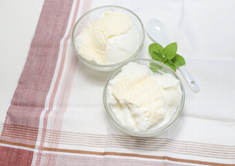 Natural yogurt or yoghurt with cream and mint
