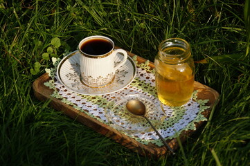 bottle with honey and flowers