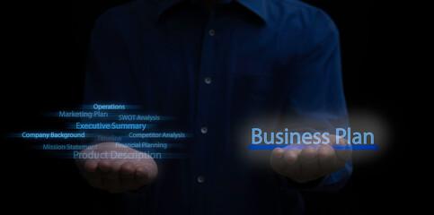 New entrepreneur holding virtual word of the topic and business plan components, strategy of successful business