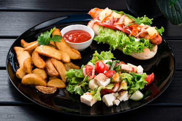 Indian food set kachumber vegetable salad, Indian potato slices and indian hot dog