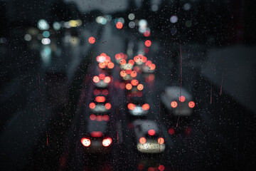 traffic in the city during rainfall, autumn weather