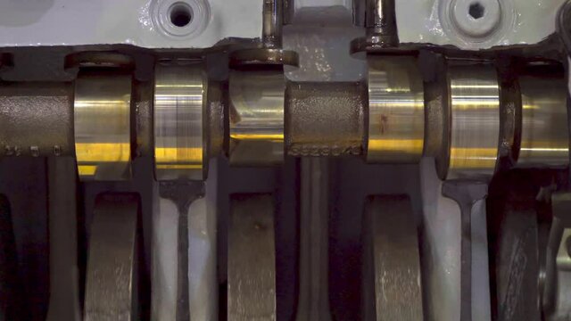 The structure and operation of the diesel engine of the truck in the context, close-up