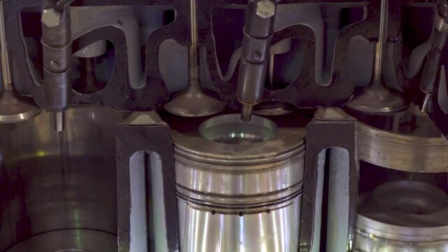 The structure and operation of the diesel engine of the truck in the context, close-up
