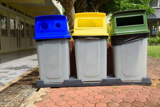 Garbage bins separated by colors