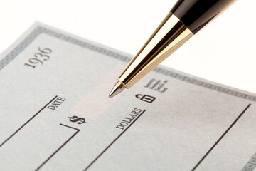 Close-Up of Writing a Check