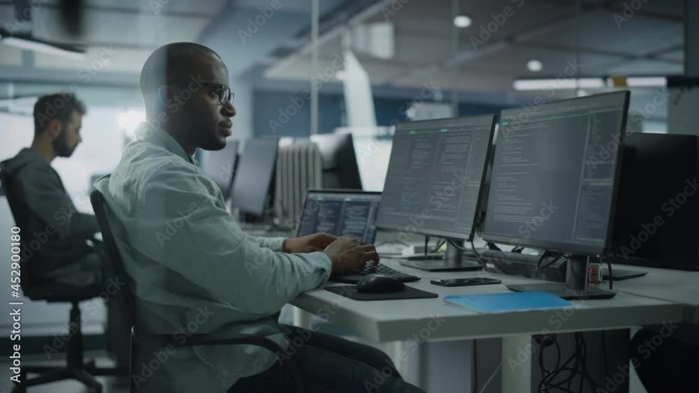 Poster Authentic Office: Professional Black IT Programmer Working on Desktop Computer. Male Website Developer and Software Engineer Developing App, Video Game. Terminal with Coding Programming Language