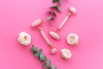 Massage stone roller with rose flowers for lifting face and wellness