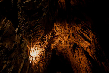 interior of the cave. Cave of Asturias through which a road passes
