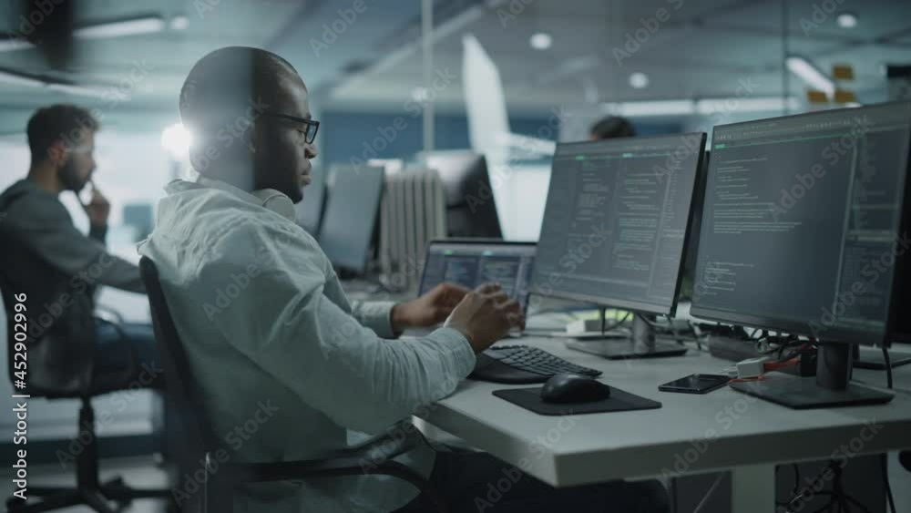 Poster Authentic Office: Enthusiastic Black IT Programmer Starts Working on Desktop Computer. Male Website Developer, Software Engineer Developing App, Video Game. Terminal with Coding Programming Language