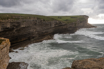 swell on the El Bolao cliff in Cantabria