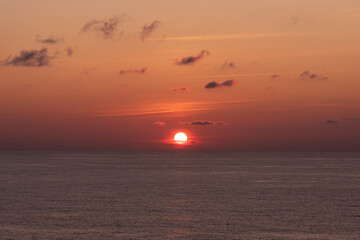 Beautiful sunset over calm Atlantic Ocean. 