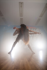 Group of multiracial dancers are exercising and practicing in their studio in slow motion