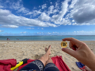 Chiiling on the beach with Bitcoin richness