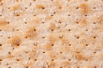 Traditional matzah bread background. Close up