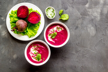 Creamy red beetroot soup with raw beets and sour cream