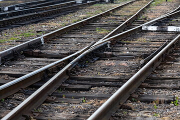 Obraz premium Railway tracks in front of the train station