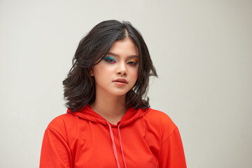 Fototapeta premium Beautiful woman with yellow and blue makeup. Professional make up.