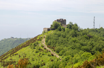 Fototapeta na wymiar View of Fort Puin in the city of Genoa Mura park trail (Parco delle Mura), Genoa, Italy.