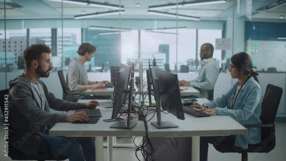 Aufkleber Diverse Multi-Ethnic Team Working in Big City Office: IT Programmers Working on Desktop Computers. Specialists Creating Innovative Software. Engineers Developing Inspiration App, Program. Wide Shot