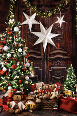Christmas background with gift boxes under the Christmas tree and teddy bear decoration