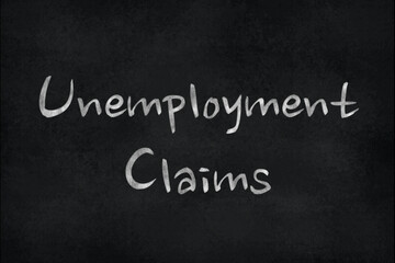 Chalk writing on a slate board – Unemployment Claims
